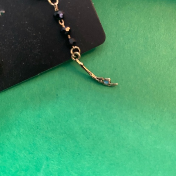 Bioworld Green and Gold Asymmetrical Earrings - Picture 3 of 4